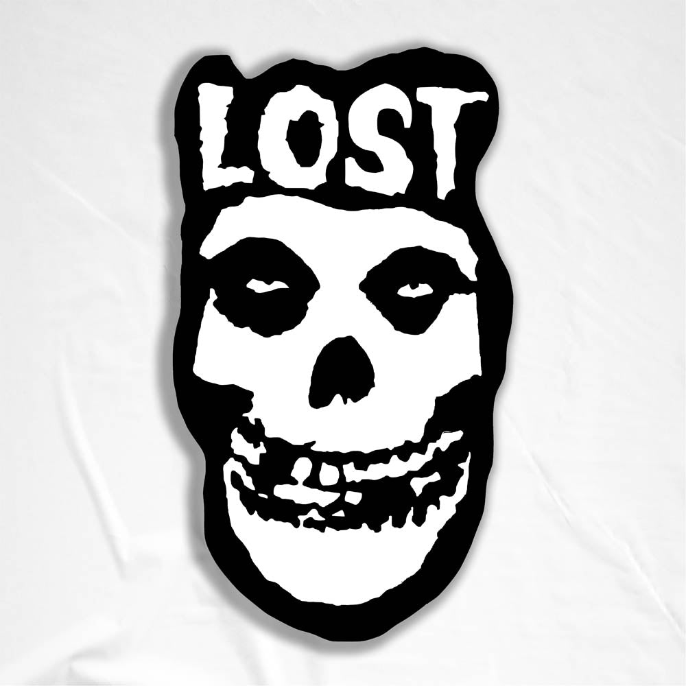 The Crimson Ghost Graffiti Sticker by LOST. A modern example of the classic black and white skull logo re-invented. The Word LOST is scrawled across the top in Bold white letters.