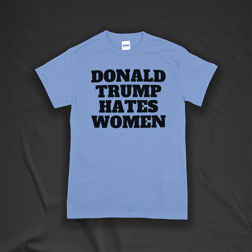 Donald Trump Hates Women t-shirt. Bold letters screen printed with black ink on a Carolina blue shirt.