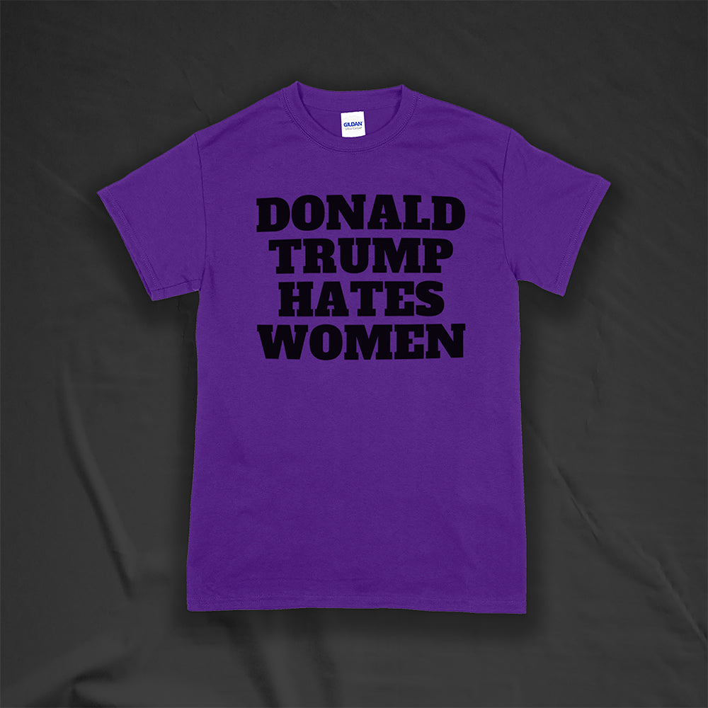 Donald Trump Hates Women t-shirt. Bold letters screen printed with black ink on a purple shirt.