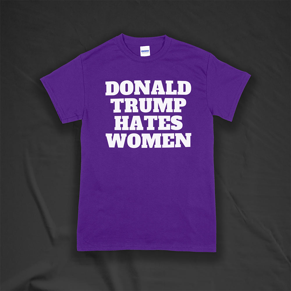 Donald Trump Hates Women t-shirt. Bold letters screen printed with white ink on a purple shirt.