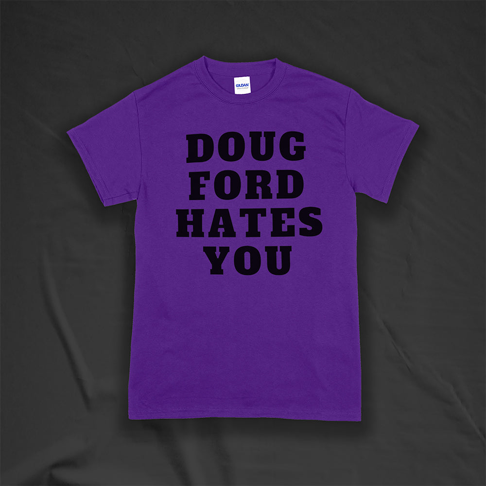 The original Doug Ford Hates You t-shirt. Bold black letters screen printed on a purple shirt.