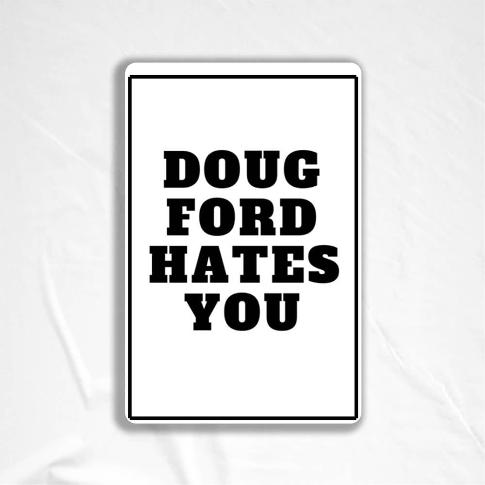 The original Doug Ford Hates You sticker by Christopher Reilly. Black and white design featuring the statement "Doug Ford Hates You" in bold letters.