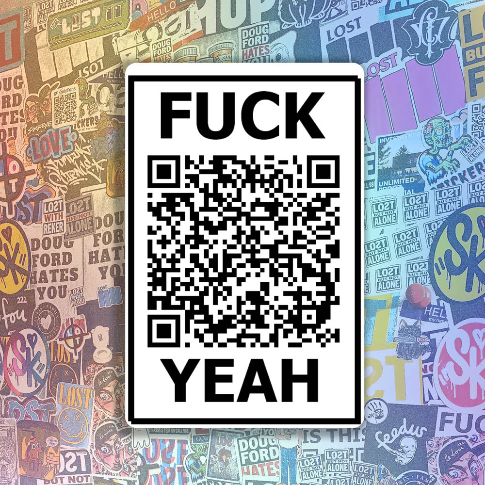 The Fuck Yeah thermal sticker by Lost Black and white design featuring a QR code. A wall of colorful graffiti stickers provides a unique background for the sticker.