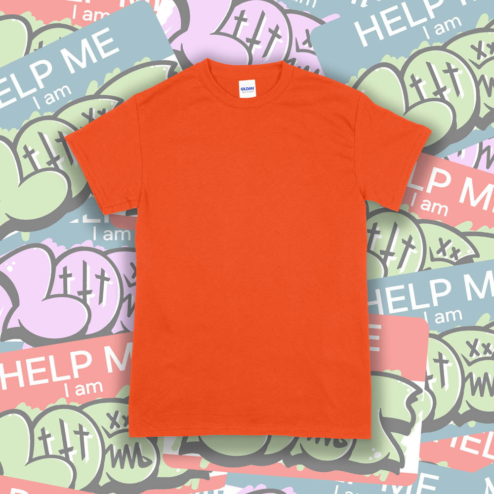 A blank Gildan shirt template. The bright orange Gildan t-shirt is displayed against a wall of colorful graffiti stickers.