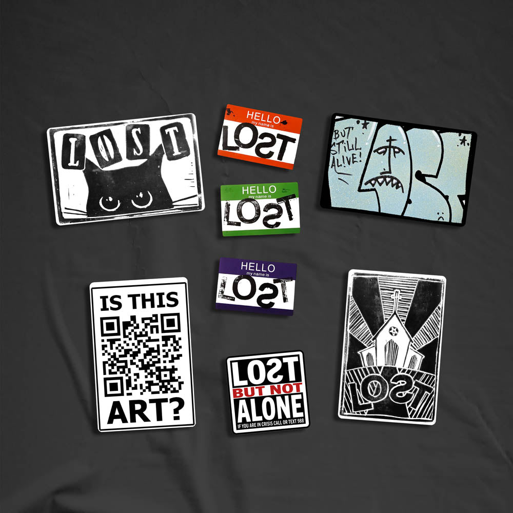 A large display of graffiti stickers of various sizes and colors. The display includes a selection of hand drawn stickers, stamped stickers, and diecut graffiti stickers. These stickers are shown against a black textured background.