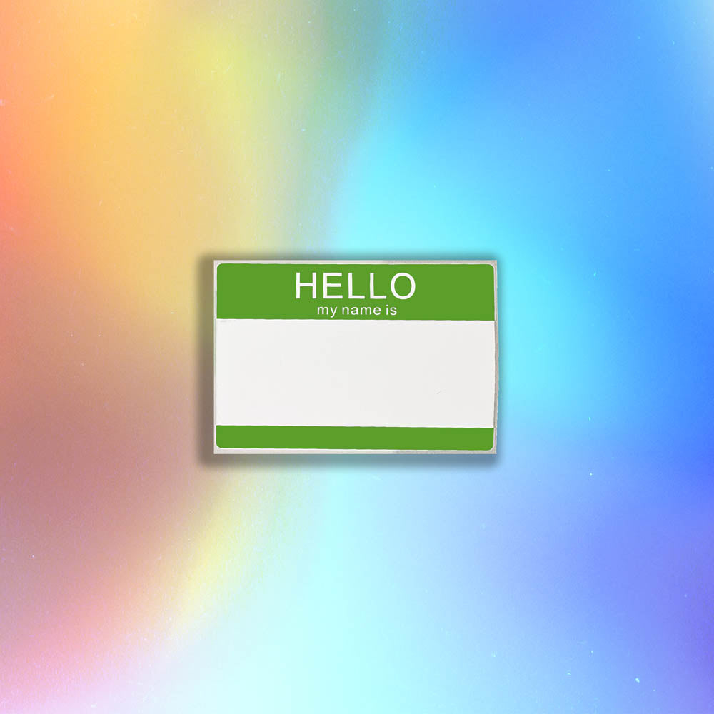 Hello my name is blank nametag sticker. A green and white nametag sticker waiting to be tagged. The sticker is set against a holographic background.