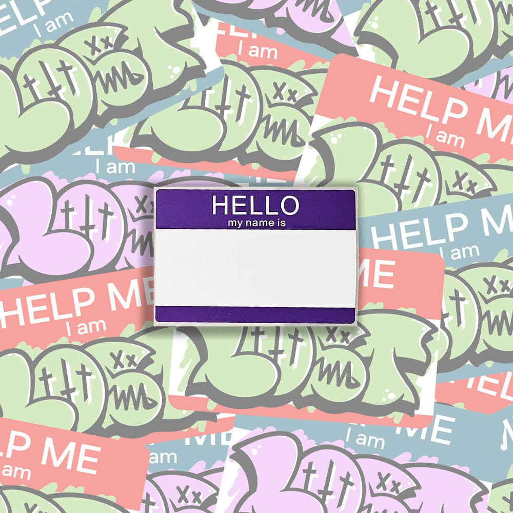 Hello my name is blank nametag sticker. A purple and white nametag sticker waiting to be tagged. The sticker is set against a collection of colorful graffiti stickers.