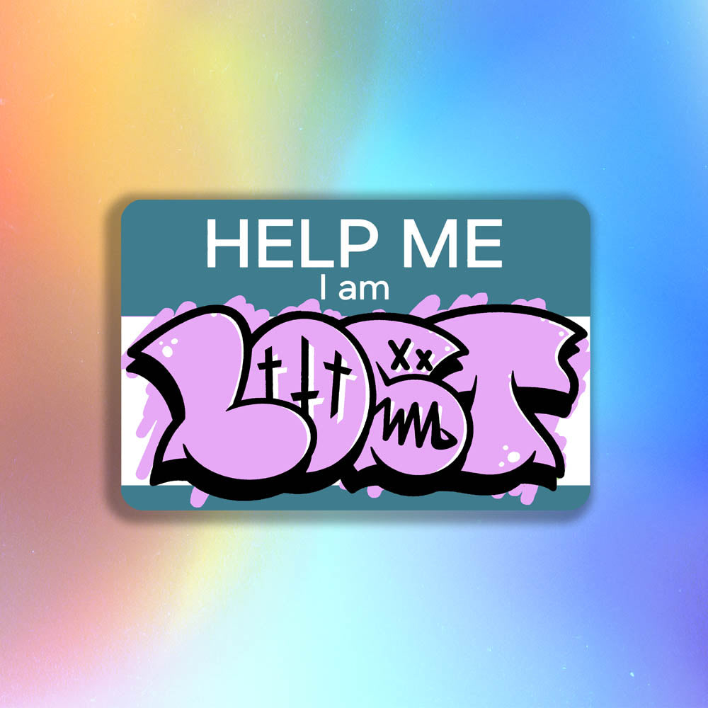 The Help Me I Am Lost graffiti nametag sticker. A blue hello my name is sticker edited to say Help Me I Am followed by a pink and black lost graffiti throwie.