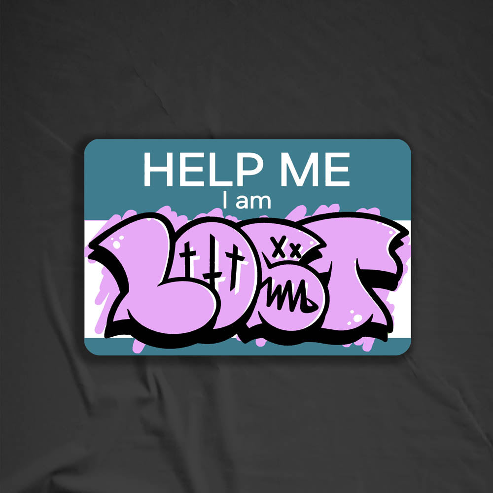 The Help Me I Am Lost graffiti nametag sticker. A blue hello my name is sticker edited to say Help Me I Am followed by a pink and black lost graffiti throwie.