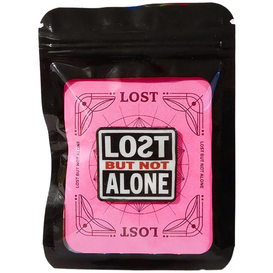 LOƧT BUT NOT ALONE pin with extended post and rubber stopper.