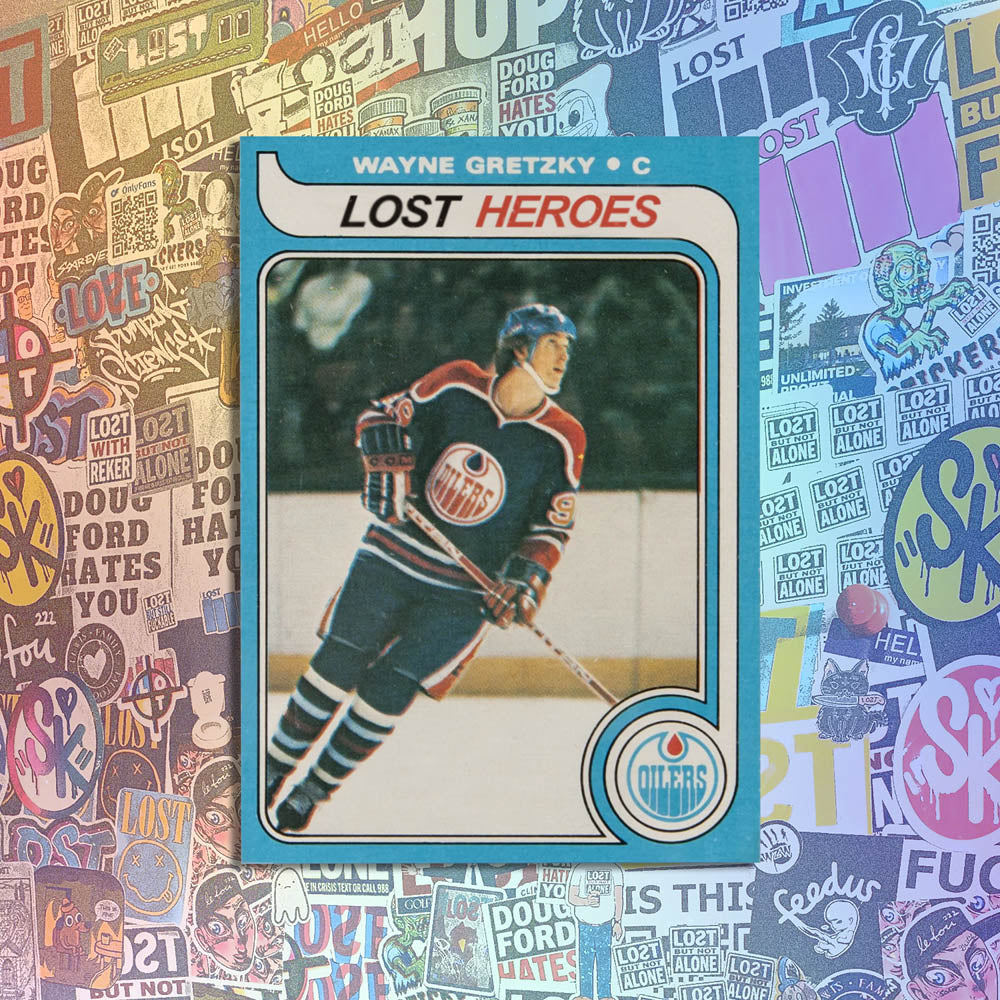 Lost Heroes graffiti sticker that features a replica Wayne Gretzky rookie card with the team name listed at Lost Heroes. The sticker is displayed against a background of graffiti stickers. 