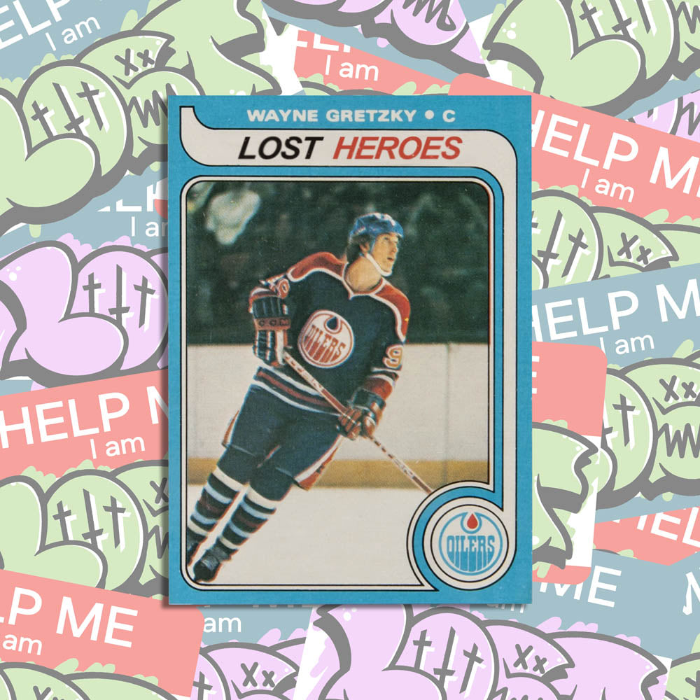 Lost Heroes graffiti sticker that features a replica Wayne Gretzky rookie card with the team name listed at Lost Heroes. The sticker is displayed against a background of graffiti stickers. 