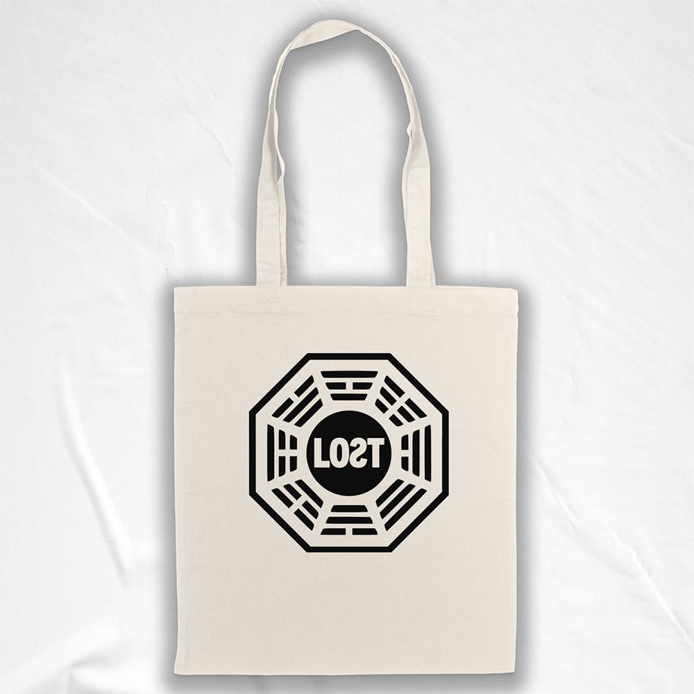 The bold and iconic octagon logo with the word LOST printed in bold black ink and displayed on a large natural canvas tote bag. The bag is displayed on a white background. 