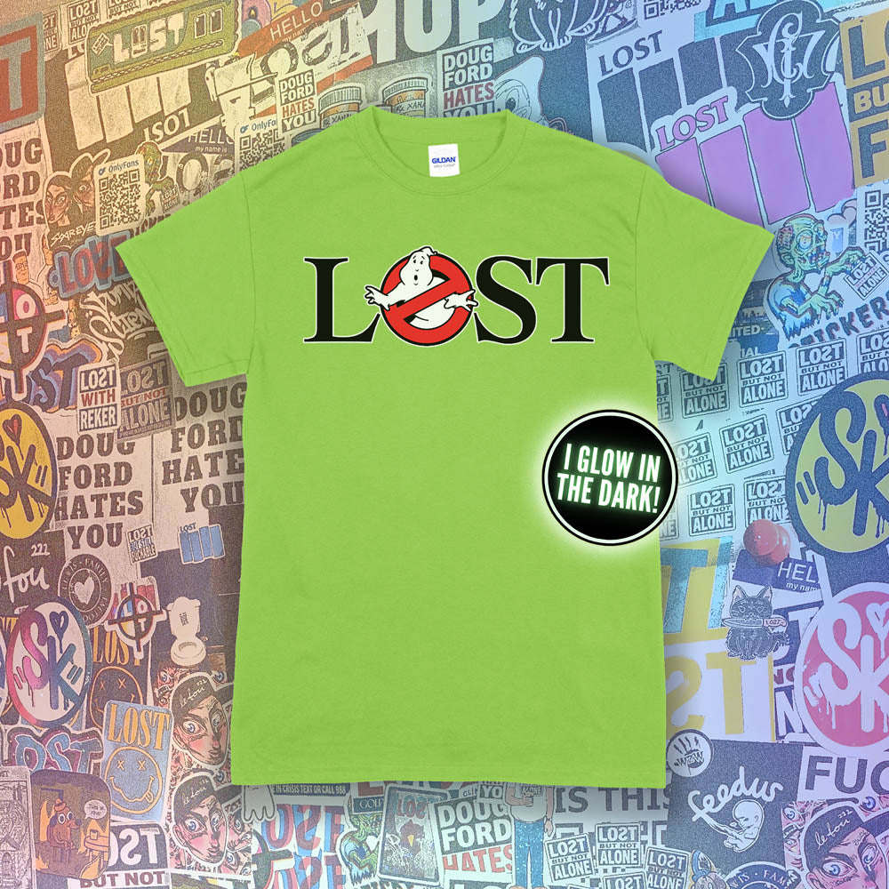 Who ya gonna call? Lostbusters! Screen printed logo with a glow in the dark ghost. Printed and displayed on a bright green t-shirt with a collection of graffiti stickers providing the background.