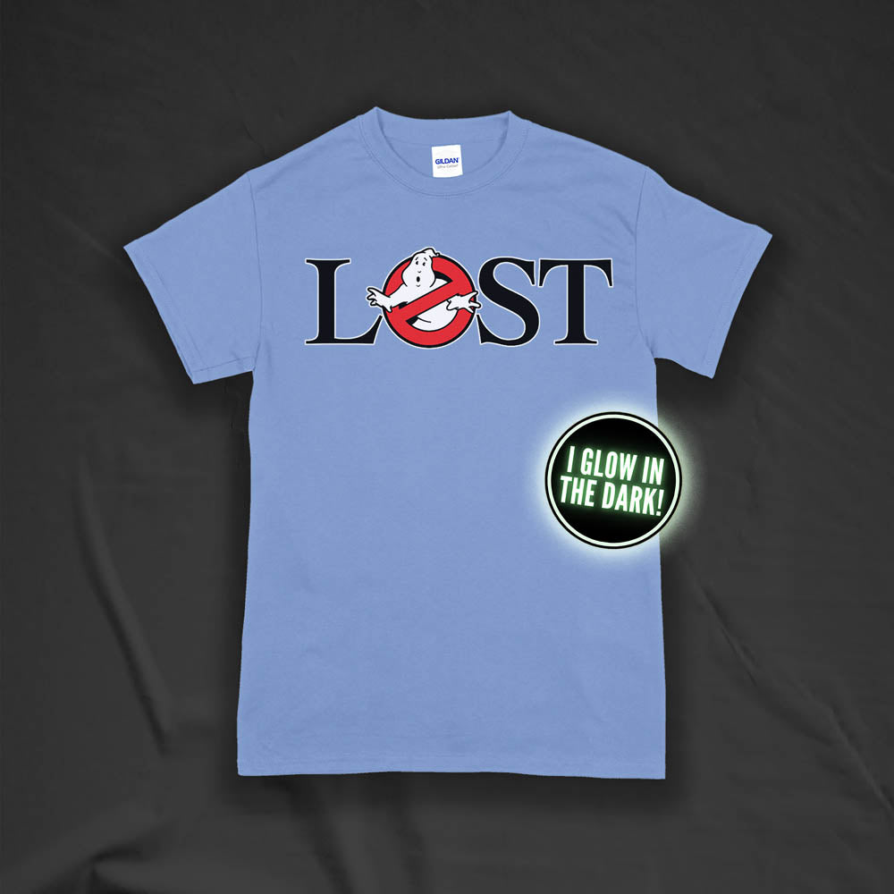 Who ya gonna call? Lostbusters! Screen printed logo with a glow in the dark ghost. printed and displayed on a light blue t-shirt.