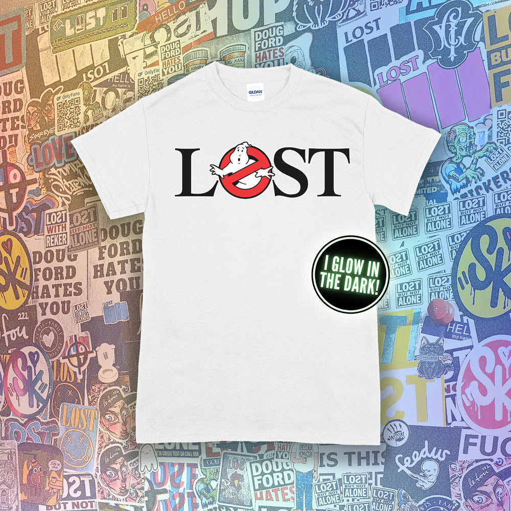 Who ya gonna call? Lostbusters! Screen printed logo with a glow in the dark ghost. Printed and displayed on a white t-shirt with a collection of graffiti stickers providing the background.