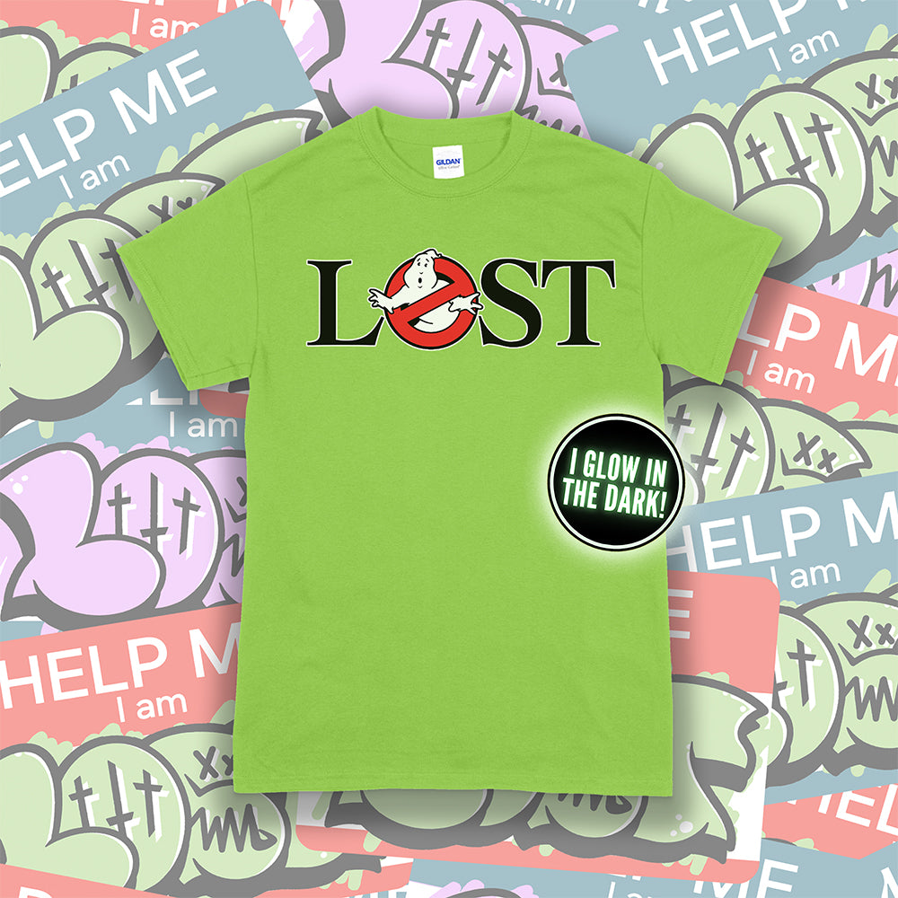 Who ya gonna call? Lostbusters! Screen printed design with a glow in the dark ghost. Featuring a bright green shirt with a colorful graffiti sticker background.