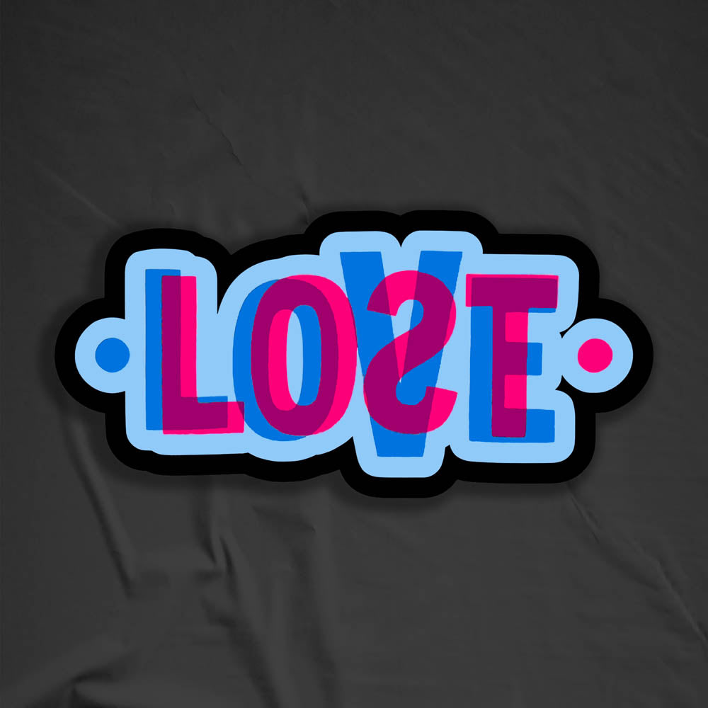 The LOVE|LOST graffiti sticker. This die-cut sticker features The word LOST in pink overlapping and mixing with the word LOVE in blue below it. The sticker is surrounded by a thick black outline with a dark gray background.