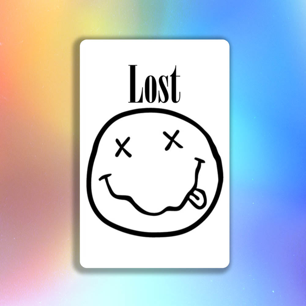 The In Bloom sticker by LOST. Black and white smiley face design with  LOST written above it.