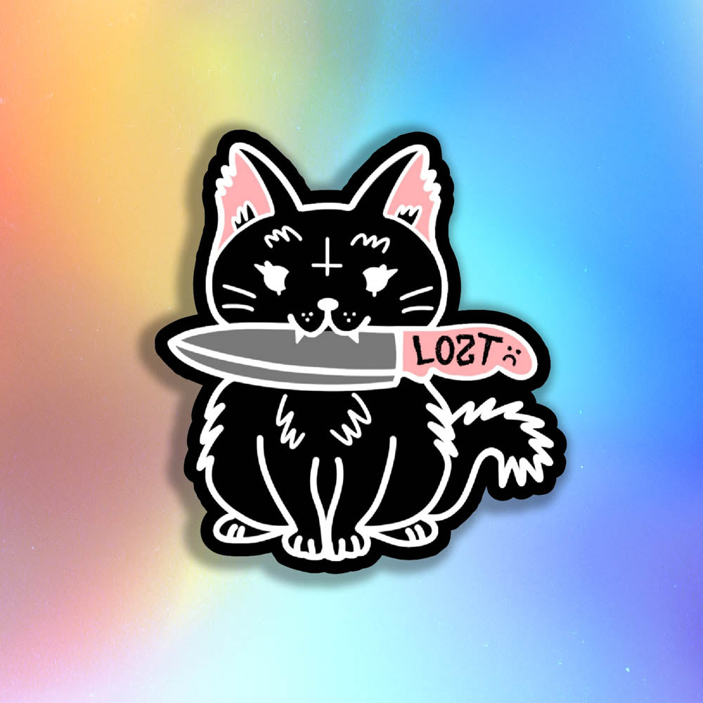 Pancake graffiti sticker. This die-cut sticker features the black cat Pancake holding a knife in her mouth. The sticker is displayed against colorful holographic background.