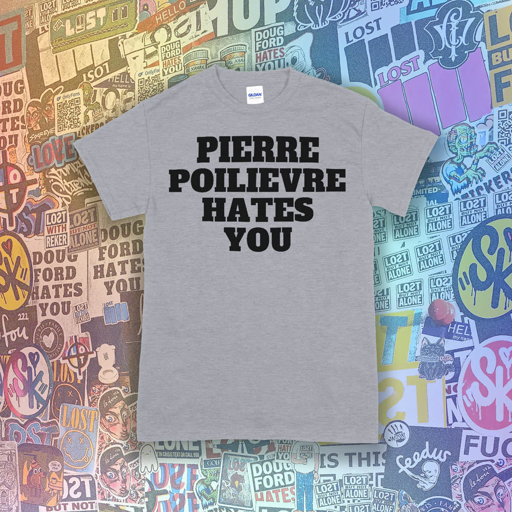 The Pierre Poilievre Hates You t-shirt. Bold letters screen printed with black ink on a grey t-shirt. A collection of colorful graffiti stickers make up the background for this shirt by Lost Streetwear.