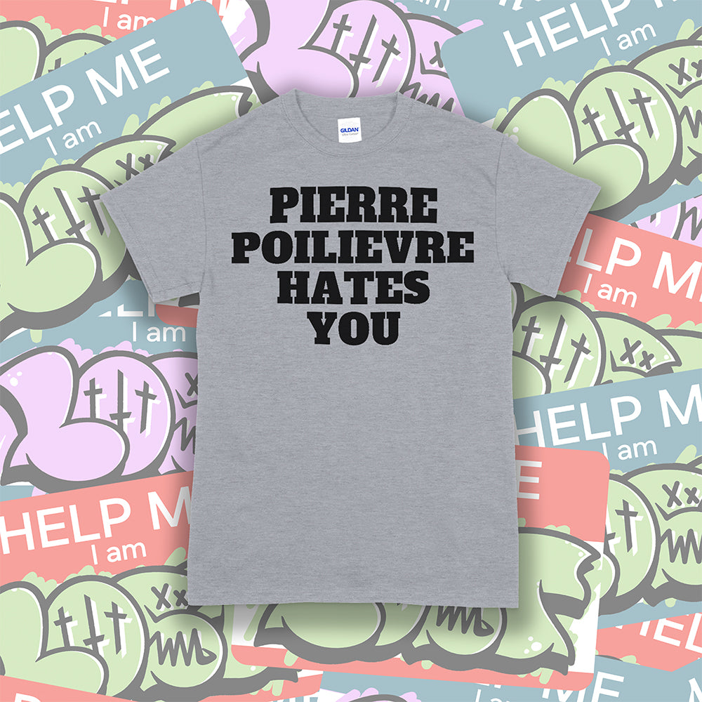 The Pierre Poilievre Hates You t-shirt. Bold letters screen printed with black ink on a gray shirt. Assorted colorful graffiti stickers make up the background.