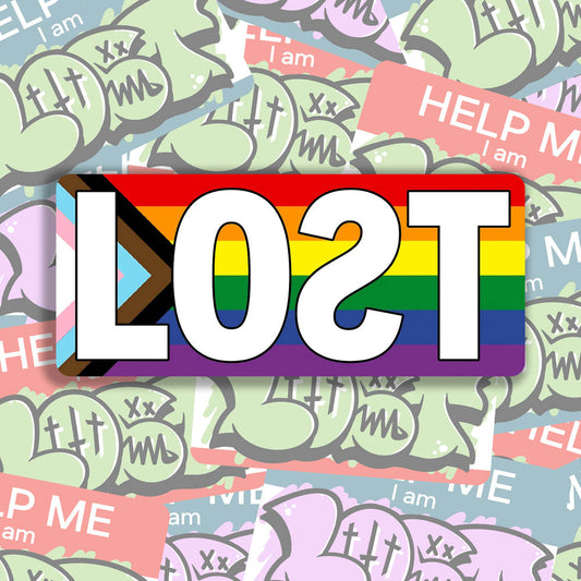 The LOST Progress graffiti sticker. The word LOST written in bold white letters on top of a rainbow progress flag. The sticker is displayed against a background of colorful graffiti stickers.