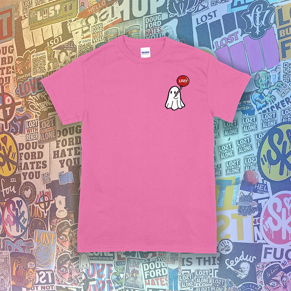 Sad Ghost with a balloon t-shirt by Lost Streetwear. Full color design on an azalea pink shirt. Graffiti Stickers in the background.