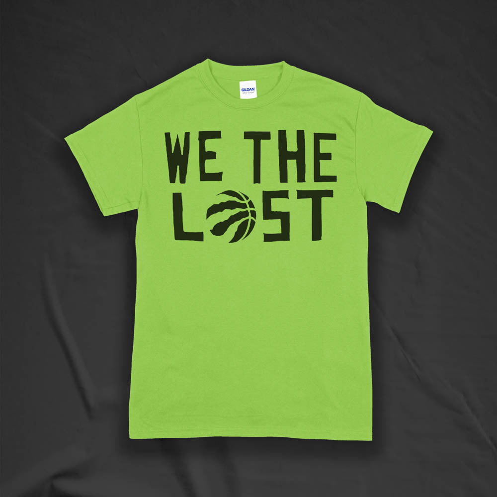 We The Lost t-shirt. Bold black lettering screen printed on a bright green shirt.