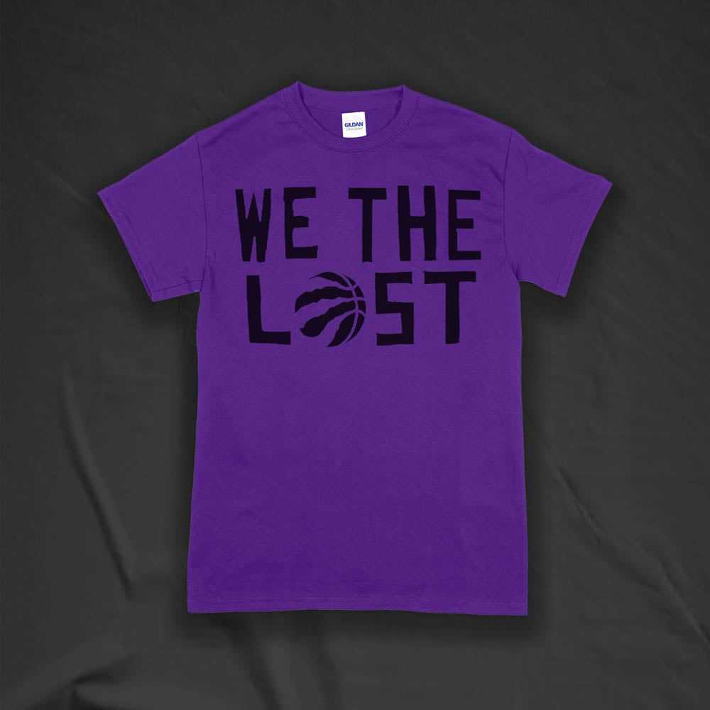 We The Lost t-shirt. Bold black lettering screen printed on a purple shirt.