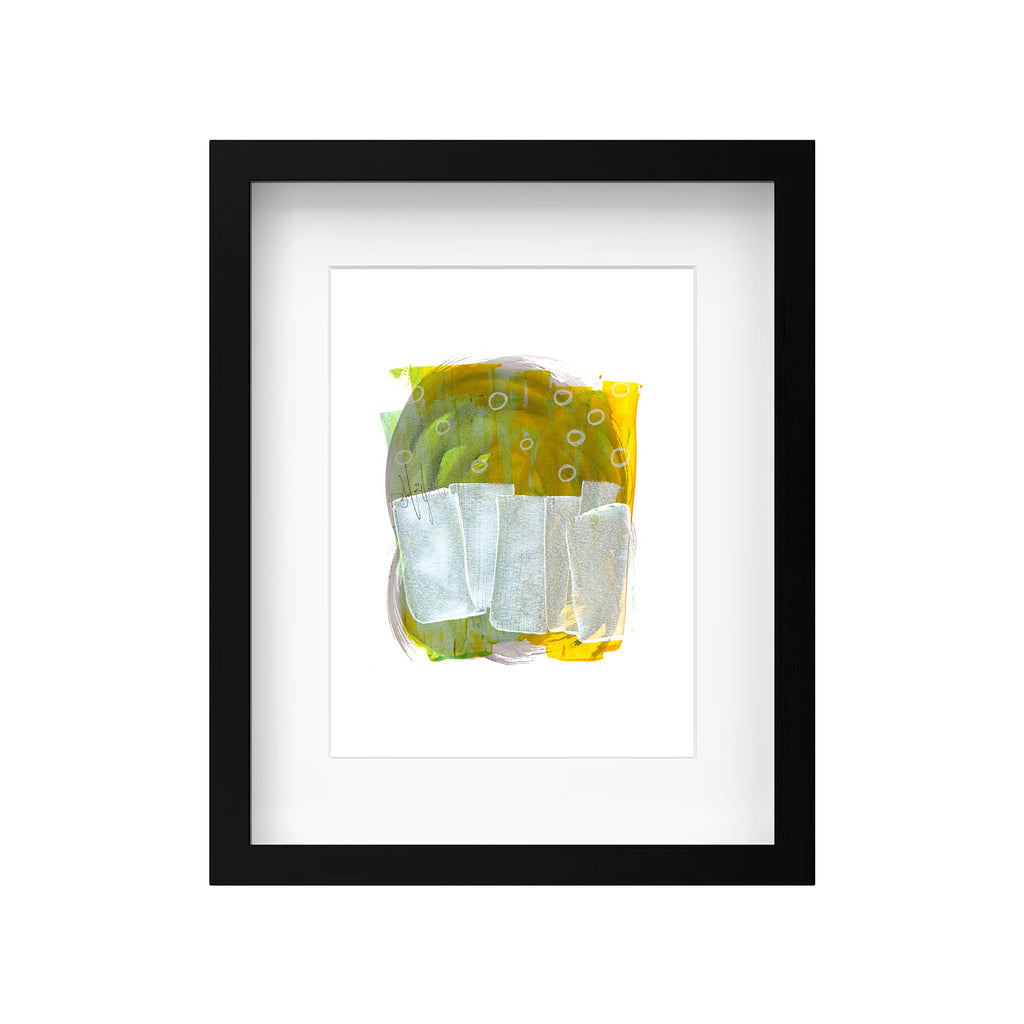 A product mockup displaying Christopher Reilly's original mixed-media abstract artwork, Painting 263, beautifully displayed inside a modern black wooden frame with a clean white mat board to highlight the green, yellow, and silver composition.