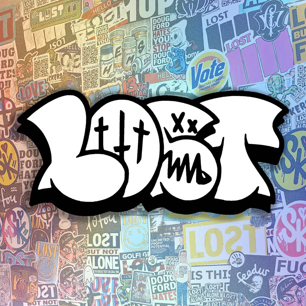 The large graffiti throwie sticker by LOST. A simple two color die cut design featuring the graffiti style word LOST in in bright white with a thick black outline and 3D shadow effect. The sticker is set against a wall of stickers by graffiti artists from around the world.